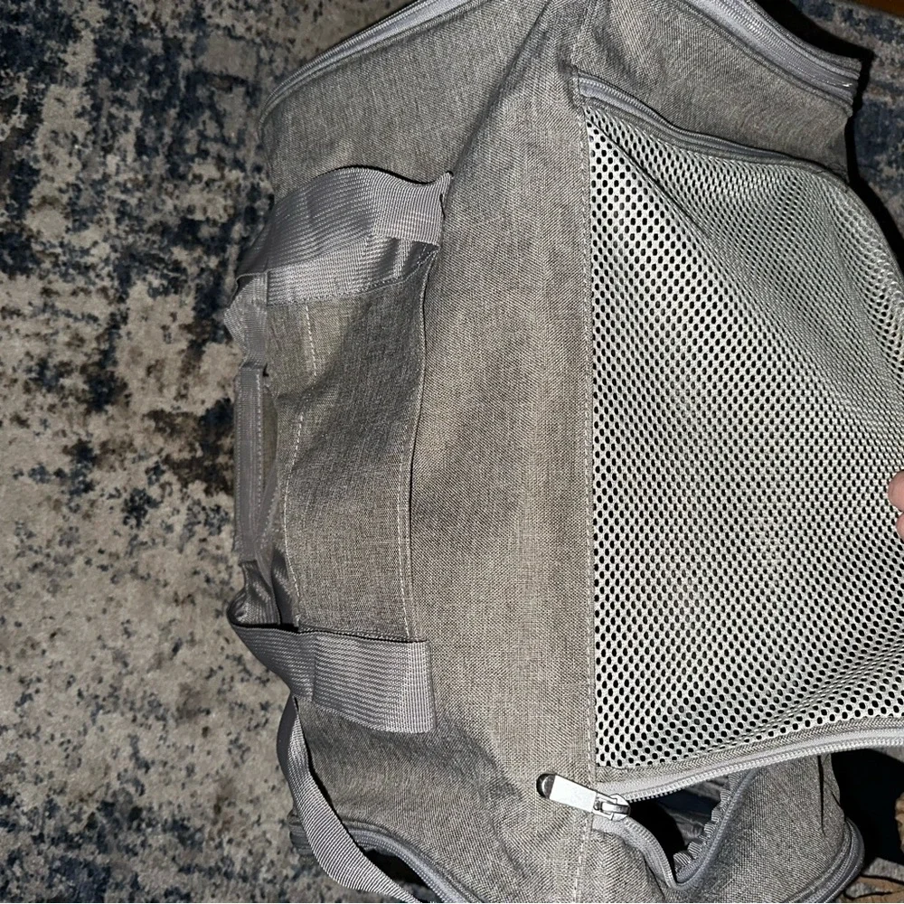 Airport approved pet carrier. Carries up to 50lbs.